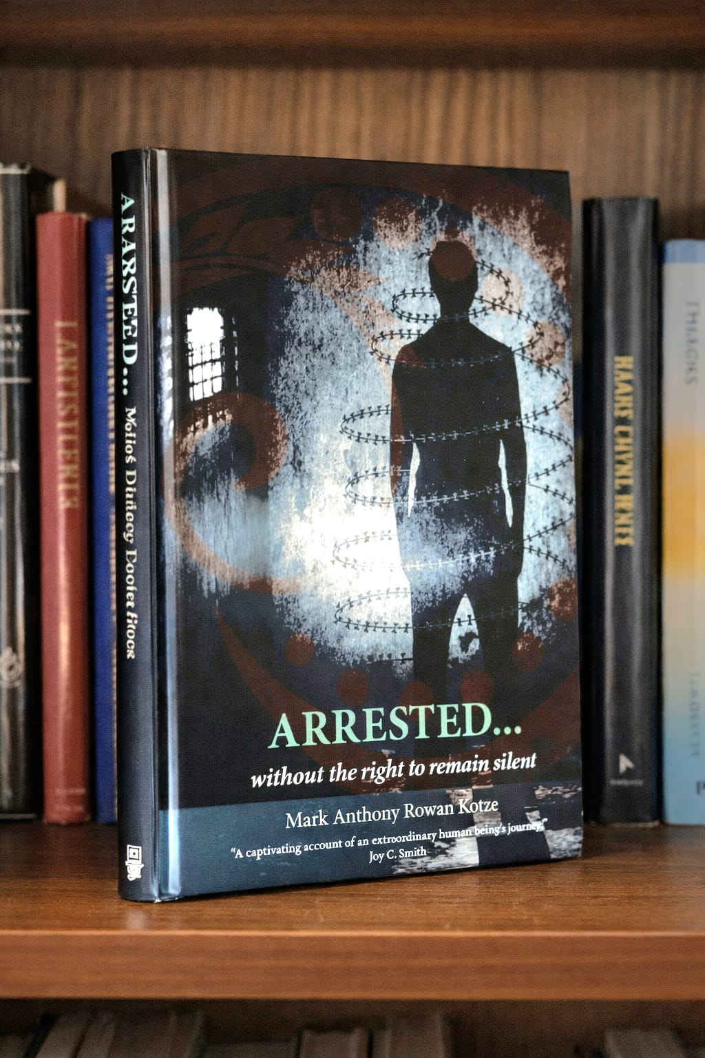 Arrested without the right to remain silent book cover by Mark Anthony Rowan Kotze